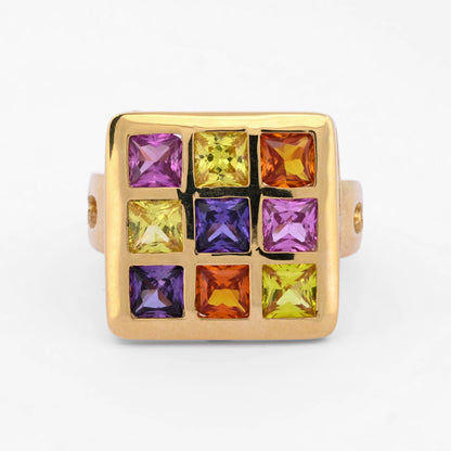Anillo de oro amarillo de 18kt en forma de "cuadrado" con 9 piedras topacios de 4 colores distintos (amarillo, naranja, lila y rosa). Envío gratiuto, Joyería Ian'OR, envío asegurado.