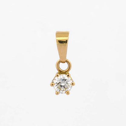 Colgante de oro amarillo de 18k y diamante talla brillante de 0.25cts montado en 6 grapas. Joyas de segunda mano baratas. Ian'Or.