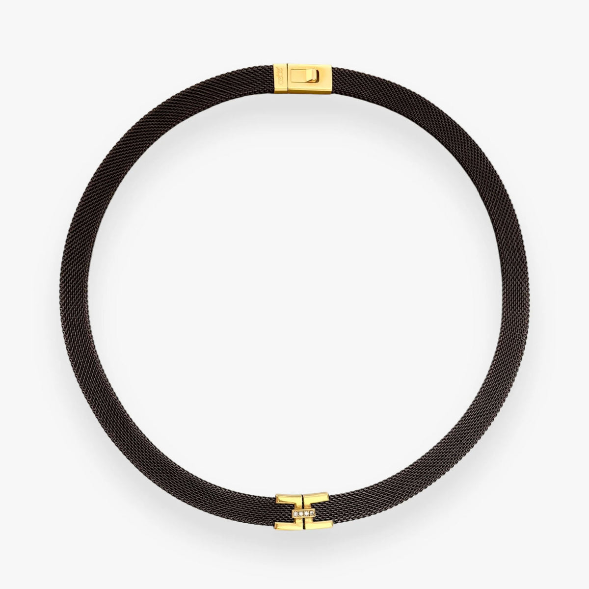 Gargantilla de acero inoxidable revestido negro a la milanesa acompañada de detalles de oro amarillo de 18kt y brillantes. Joyería compro oro Ian'Or.