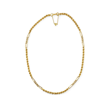 Collar de Oro amarillo de 18kt con cadena de cordón salomónico alterno con barras de oro de 18kt. La cadena mide 53cm de largo y dispone de un cierre tipo anzuelo con un cierre de seguridad.