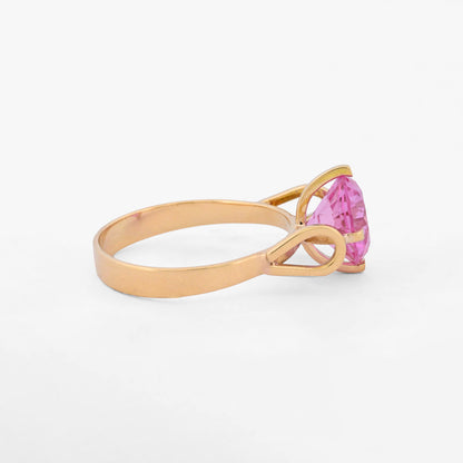 Comprar anillo solitario de oro amarillo de 18k con el toque fresco de un zafiro rosa en talla brillante. Envío gratiuto, Joyería Ian'OR, envío asegurado