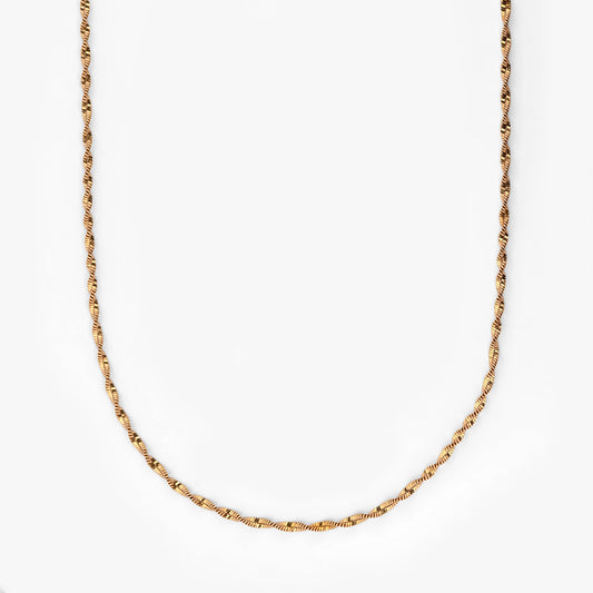 Comprar cadena Singapur de oro amarillo 18kt con eslabones trenzados de diseño retorcido y brillo único. Envío gratuito pieza certificada.