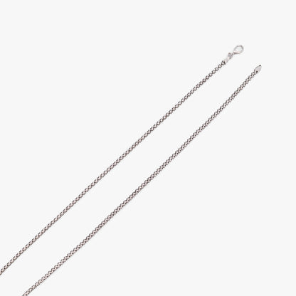 Comprar collar de cadena palomita de oro blanco de 18K con estructura tubular texturizada. Pieza sofisticada que destaca por resistencia y diseño. Envío gratis