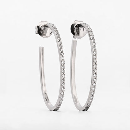 Pendientes de oro blanco de 18kt con forma de aro ovalado y (brillantes)Envío GRATIS, Joyería Ian'OR, envío asegurado.