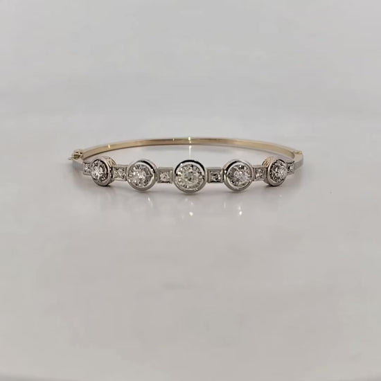 Comprar pulsera esclava Art Deco realizada en oro amarillo de 18kt y platino con diamantes talla antigua a lo largo de la pulsera. Ian'Or. vintage