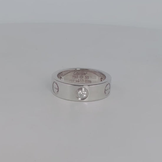 Anillo original de la prestigiosa firma Cartier de la colección LOVE realizada en oro blanco con engaste de 3 brillantes. Joyas Cartier Originales