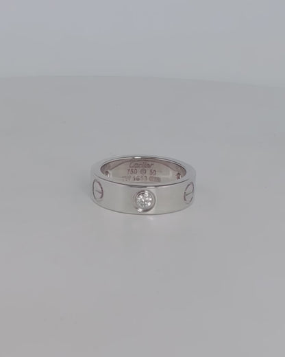 Anillo original de la prestigiosa firma Cartier de la colección LOVE realizada en oro blanco con engaste de 3 brillantes. Joyas Cartier Originales