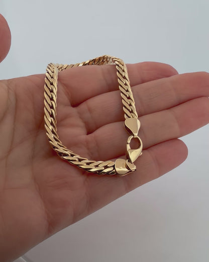 Comprar pulsera oro amarillo de 18kt con cadena tipo cubana. La pulsera mide 21
mm de largo y 6,25mm de grosor. Dispone de cierre tipo mosquetón. Joyeria Ian'Or