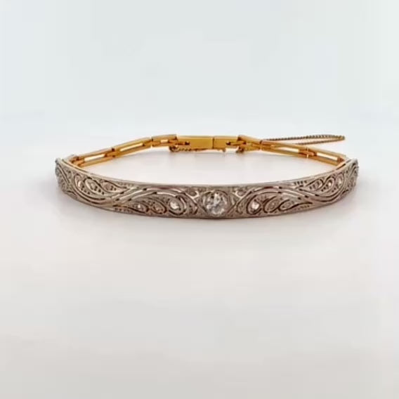 Comprar pulsera semirrígida Art Deco realizada en oro blanco de 18kt y platino con diamante central y diamantes talla antigua a lo largo de la pulsera. Ian'Or.