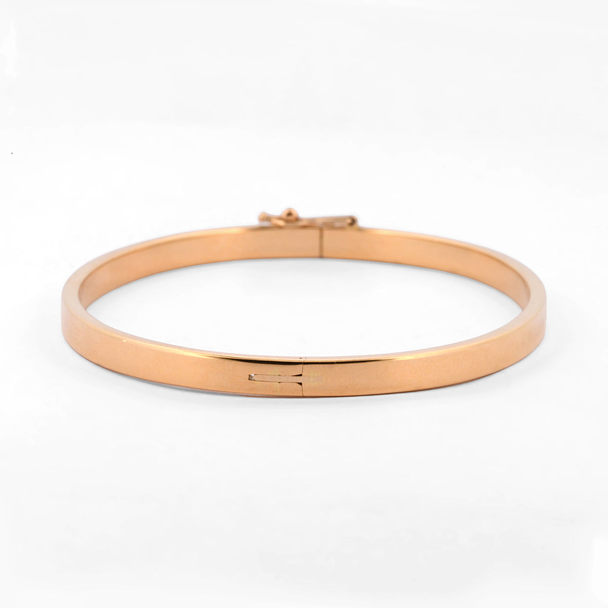 Comprar pulsera rígida tipo caña en oro amarillo de 18kt con cierre de seguridad. Joyería Ian'Or. Envío GRATIS y pieza certificada.