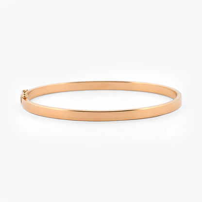 Comprar pulsera rígida tipo caña en oro amarillo de 18kt con cierre de seguridad. Joyería Ian'Or. Envío GRATIS y pieza certificada.