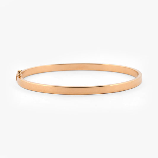 Comprar pulsera rígida tipo caña en oro amarillo de 18kt con cierre de seguridad. Joyería Ian'Or. Envío GRATIS y pieza certificada.